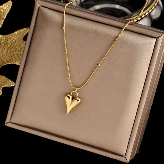 ELONGATED GOLD HEART NECKLACE